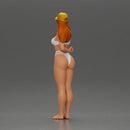 girl in a white bikini holding a phone on the beach and wearing a cap - Only-Games