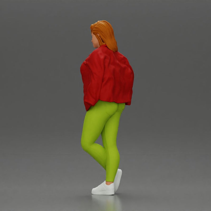 woman standing stylishly hands in pockets striking pose - Only-Games
