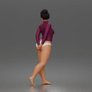 Standing woman looks back long sleeve top underwear bare feet