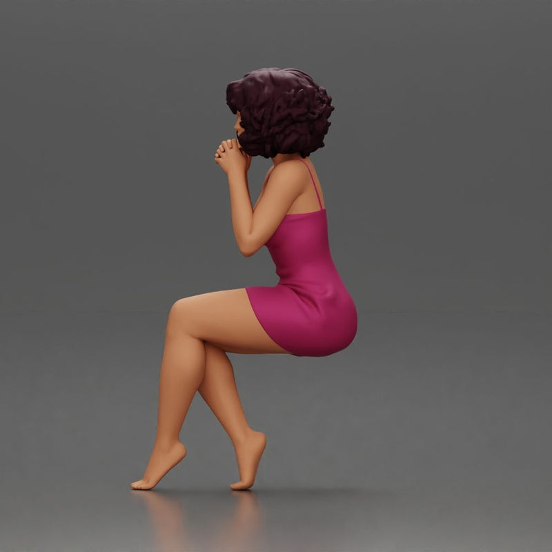 Woman in Pink Dress Sitting with Hands on Chin - Only-Games