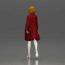 Woman with curly hair wearing red coat walking holding red handbag - Only-Games