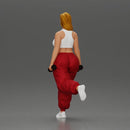 Strong woman power walking with dumbbells wearing white top and red pants - Only-Games