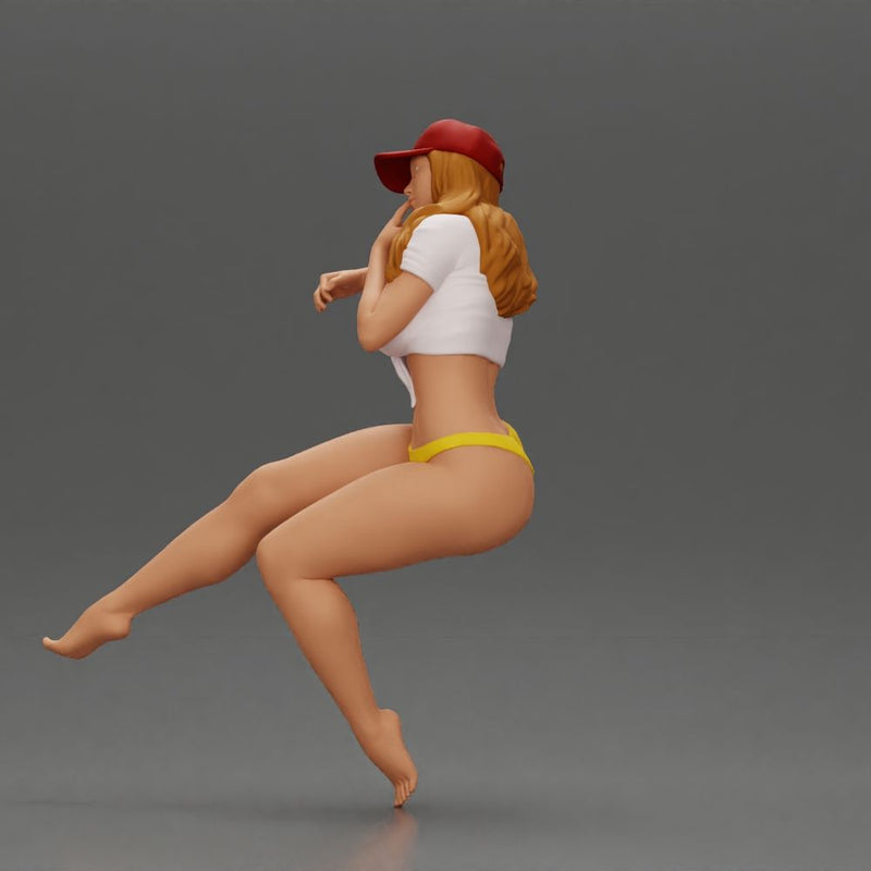 Sexy girl in cap thinking and playfully posing - Only-Games