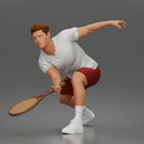 Focused Tennis Player Lunging Forward in Athletic Shirt, Shorts, and Sneakers