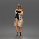 Woman Posing In Strapless Bodysuit With Long Coat And High Heel Sandals
