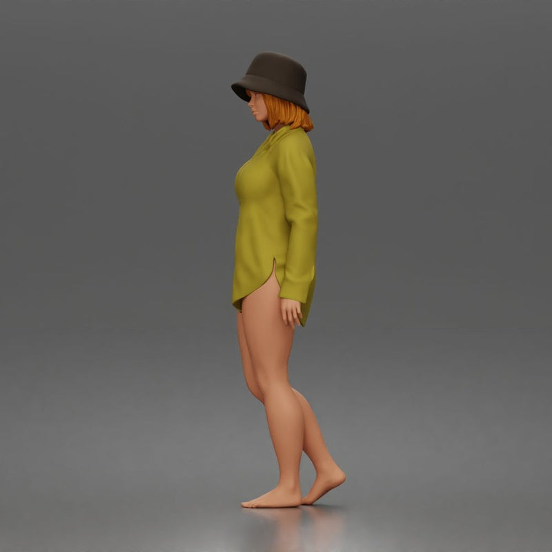 Standing woman In Oversized Button-Shirt With Bucket Hat Barefoot