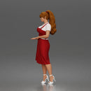 Woman standing In Belted Pinafore Dress Over Blouse With Heeled Sandals