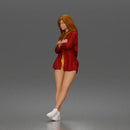 leaning woman folds arms open shirt swimwear bottoms and sneakers