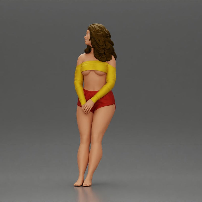 Woman in yellow top and red shorts leaning to wall - Only-Games