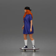 Skateboard girl in long shirt and cap gliding smoothly forward in relaxed street style pose - Only-Games