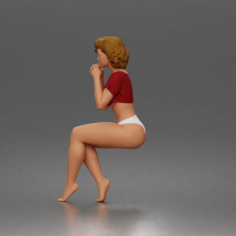 Sitting Woman Clasping Hands Near Chin In Crop Top Bottoms - Only-Games