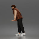 Stylish gentleman in puffer vest layered shirt joggers and sneakers