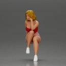 Confident Blonde Woman Sitting Gracefully in Red and Pink - Only-Games