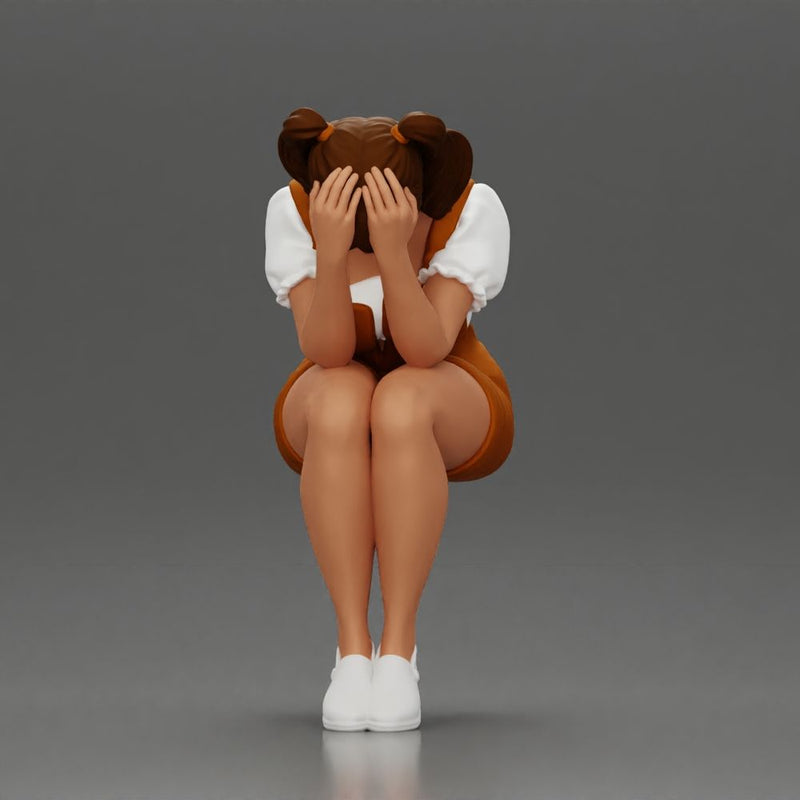 Crying girl sitting low in orange dress with head in hands - Only-Games