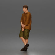 Man crosses arms wearing hoodie shorts sneakers relaxed - Only-Games