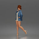 Elegant Woman Posing Confidently in Chic Jacket and Dress Outfit