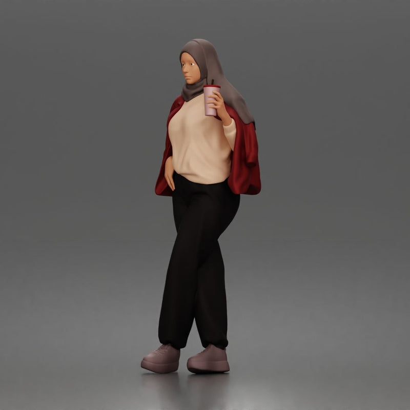 hijabi woman sipping takeaway drink in modern casual streetwear style - Only-Games