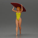 woman in yellow swimsuit carrying a red surfboard on her shoulders - Only-Games
