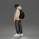 Chill Hooded Cap Walker Posing with Backpack Pants and Sneakers