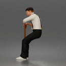 Senior Leaning On Cane Wearing Cap Suspenders Bow Tie Sneakers