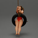 Sexy Girl in onepiece Enjoying a Fun Swinging Adventure on Tire - Only-Games