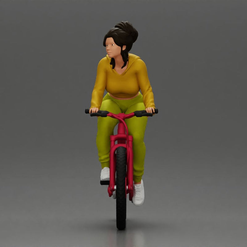 Sporty girl riding a red bike in bright yellow tracksuit - Only-Games