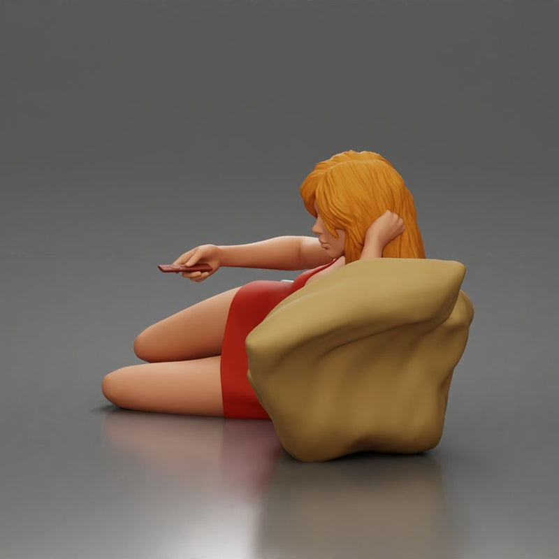 Woman lounges atop pillow watching television holding remote wearing slip dress - Only-Games
