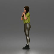 Shy casual woman standing pose in t shirt leggings sneakers - Only-Games