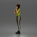 Shy casual woman standing pose in t shirt leggings sneakers - Only-Games