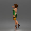 Elegant Woman Walking Confidently in Glamorous Dress, Heels, and Handbag