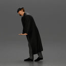 Man in black coat wearing flat cap standing with serious expression - Only-Games