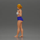 woman posing barefoot wearing bikini top and shorts stylishly - Only-Games