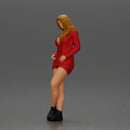 Stylish woman in red blazer dress and boots posing with crossed legs - Only-Games