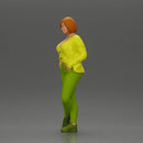 Confident woman leaning slightly with her hands in pockets - Only-Games