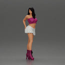 Long black haired woman in pink top and white skirt with one hand on her hip - Only-Games