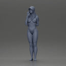 girl in a white bikini holding a phone on the beach and wearing a cap - Only-Games