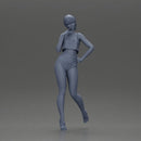 Striking a flirty pose wearing yellow crop top red bottoms - Only-Games