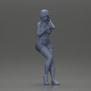 Girl casually checking her phone while striking a relaxed pose - Only-Games