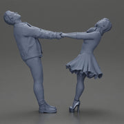 Couple leaning back holding hands enjoying a playful dance moment - Only-Games