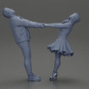 Couple leaning back holding hands enjoying a playful dance moment - Only-Games