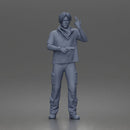 Man Standing With Handgun And Peace Sign In T-Shirt Scarf Cargo Pants And Boots