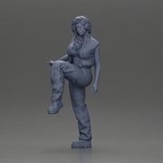 Woman in Headphones Lifting Leg in Stylish Streetwear - Only-Games