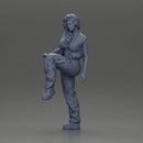 Woman in Headphones Lifting Leg in Stylish Streetwear - Only-Games