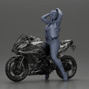 Bold Woman in Pink Jumpsuit Posing on a Sleek Motorcycle - Only-Games