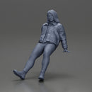 Man with long hair wearing brown jacket sitting with relaxed posture - Only-Games