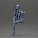 Woman sitting  with Pigtails wearing bikini smoking cigarette with contemplative gaze - Only-Games