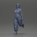 Strong woman power walking with dumbbells wearing white top and red pants - Only-Games