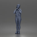 Shy casual woman standing pose in t shirt leggings sneakers - Only-Games