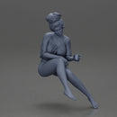 Relaxed girl in red sipping coffee enjoying a peaceful moment on the beach - Only-Games