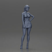Woman in silver mini dress posing with hand on hip - Only-Games